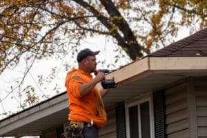 Gutter Company Eden Prairie MN A gutter installation by Lindus Construction on a home in the fall.