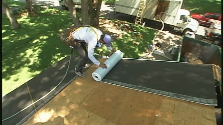 installing leak barrier ice & water shield to roofing project