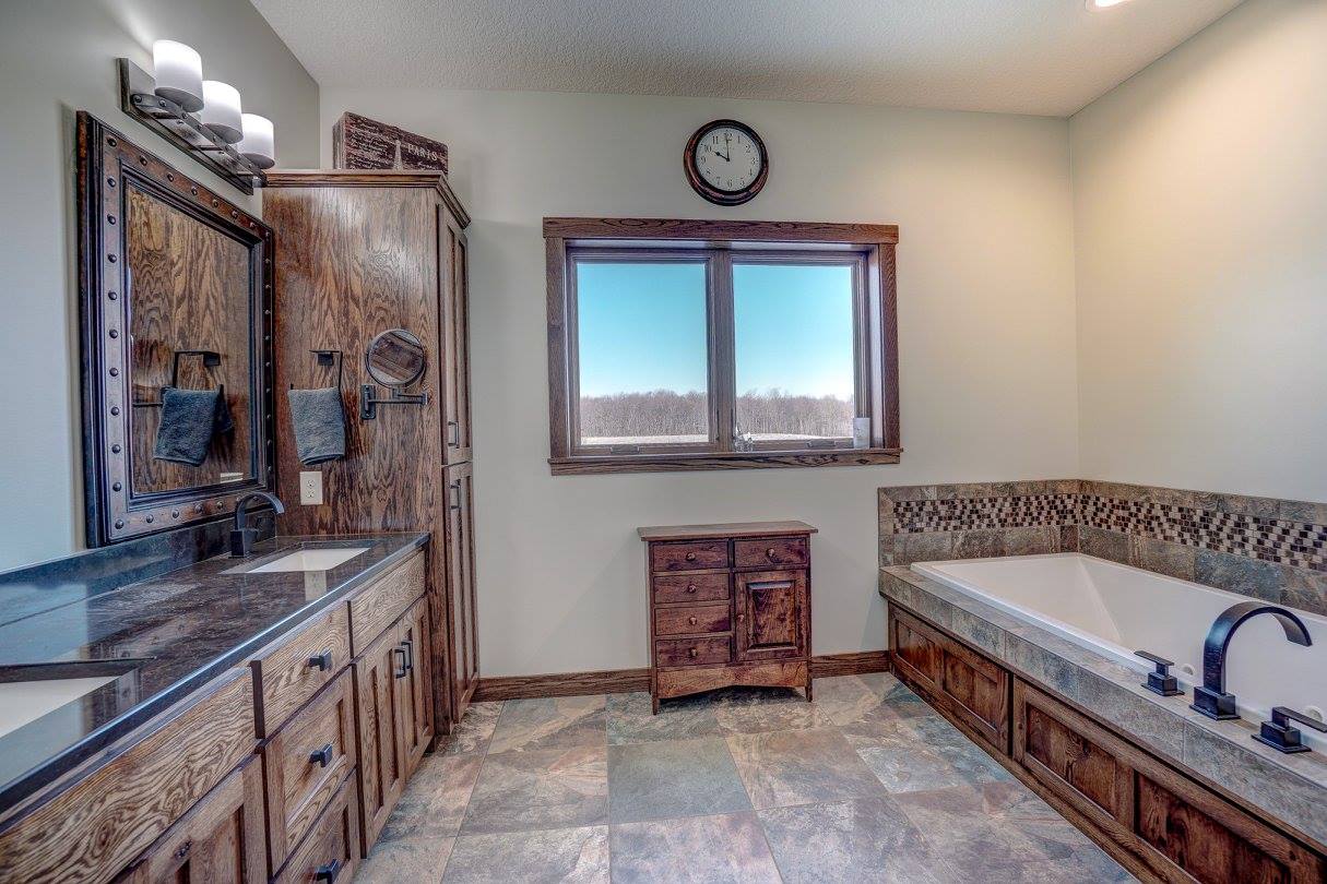 bathroom with lighting above sink