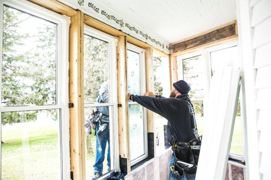 Jake & Jim installing a window with no complaints