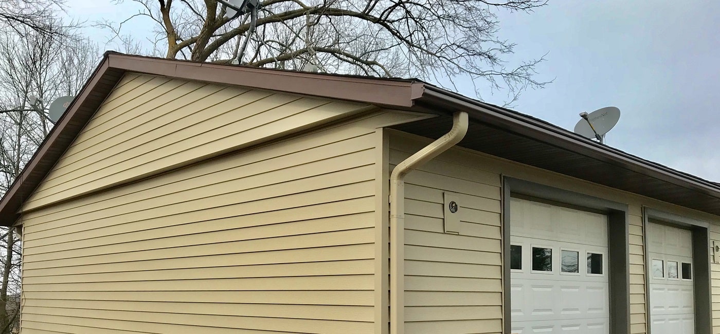 one-piece gutter guard on garage