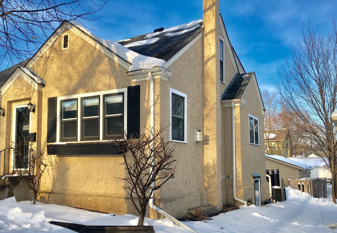 Minneapolis home before LeafGuard gutters