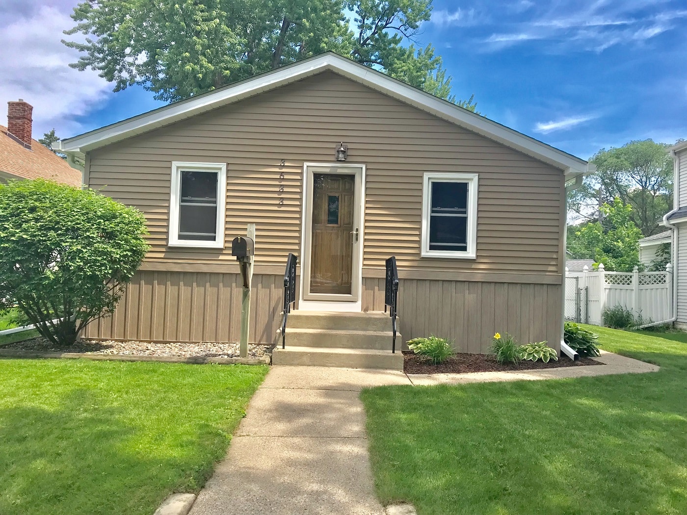steel siding and new front door in minneapolis