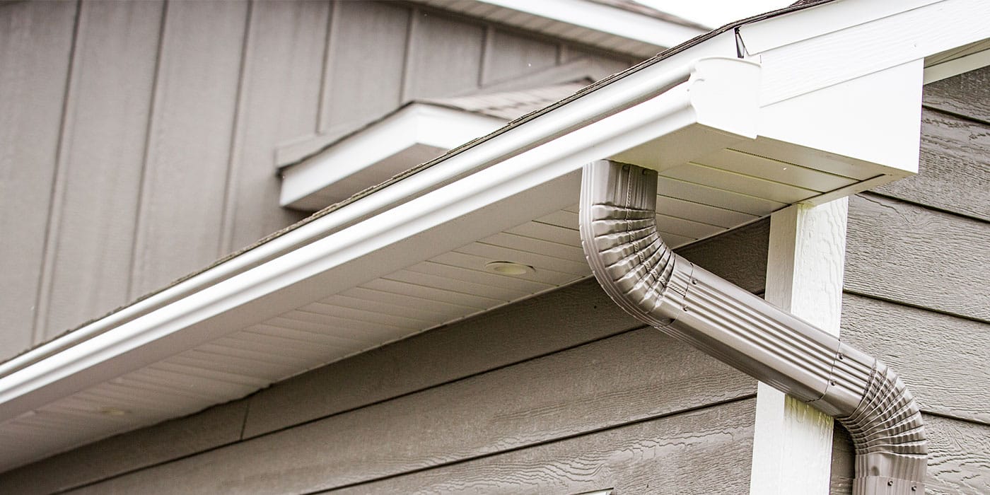replacement gutters on house