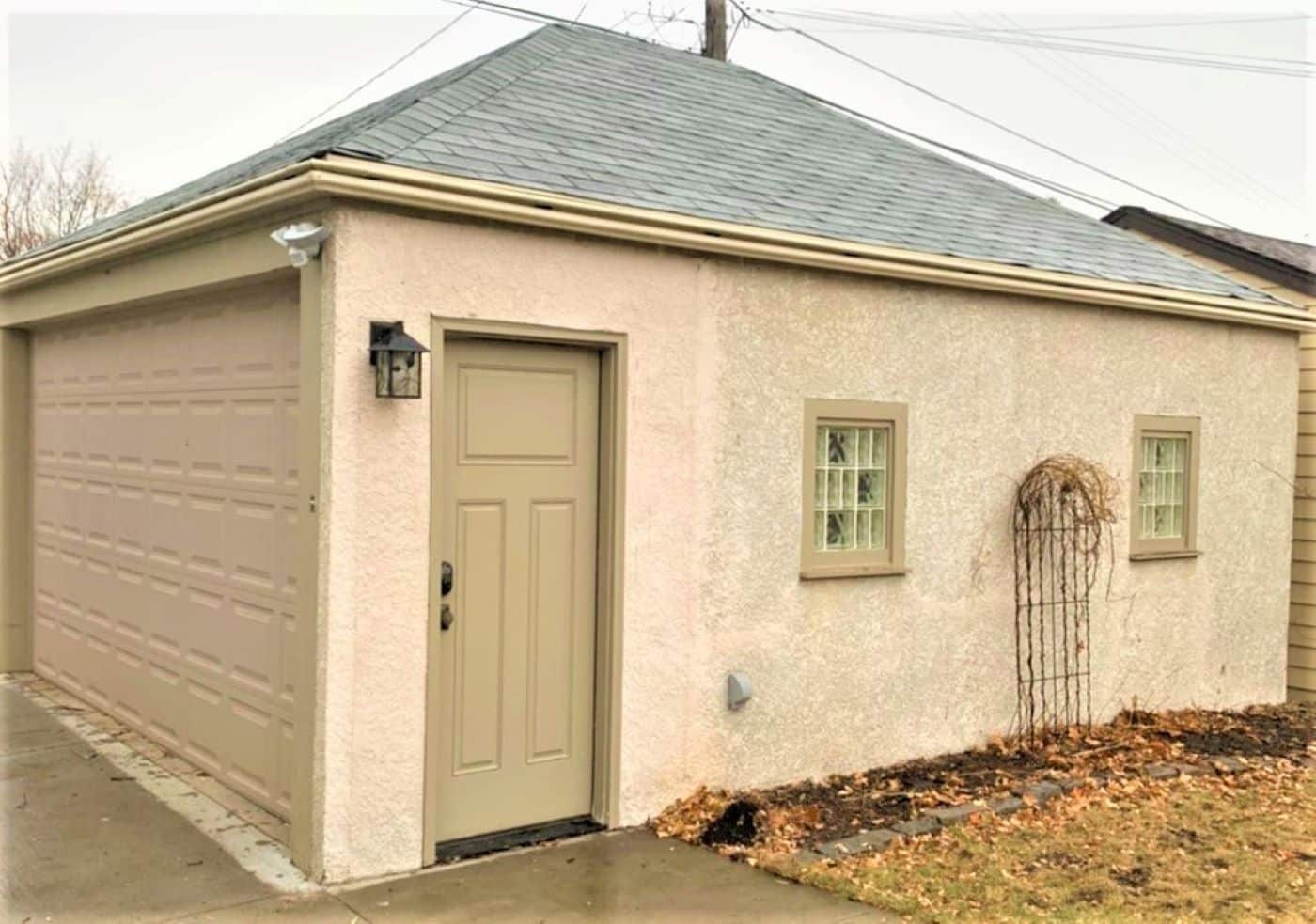 stucco siding and LeafGuard Gutters in Twin Cities