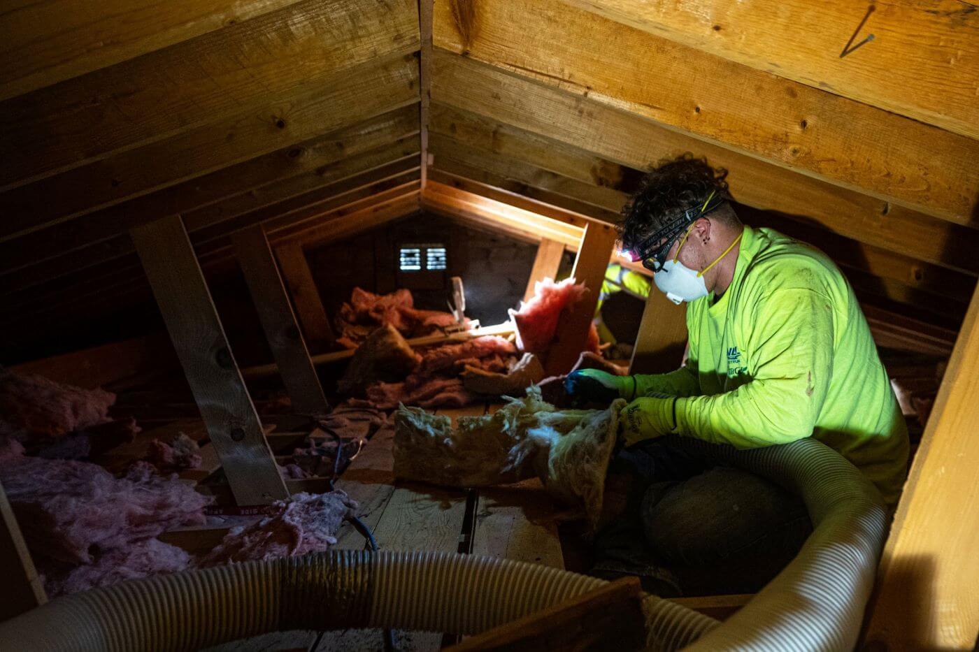 Insulation Expert Assesses Attic