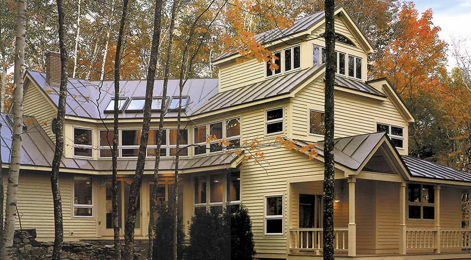 Picture of a house with a metal roof.